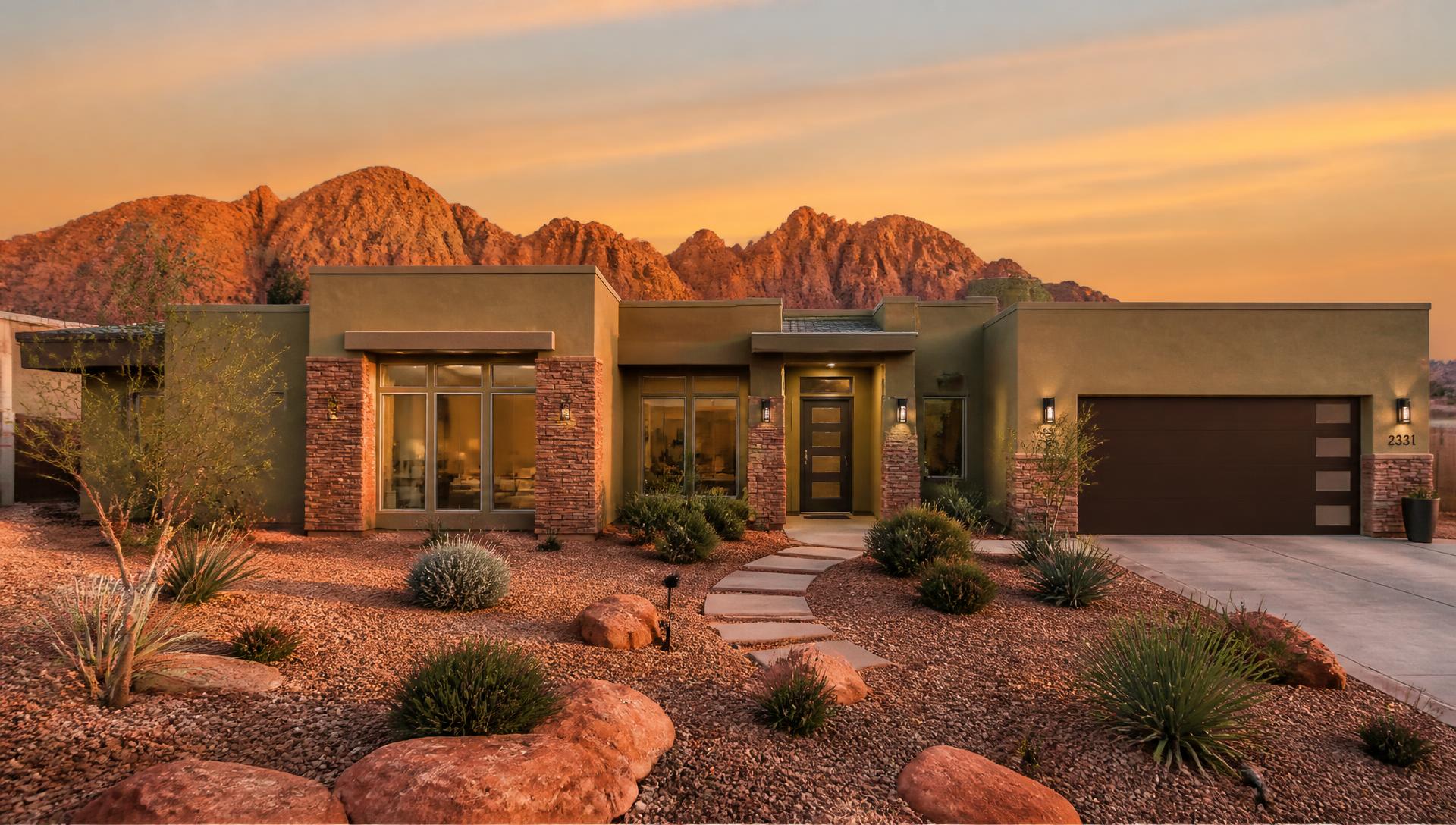 Canyon Sage Retreat exterior with red rock views at sunset